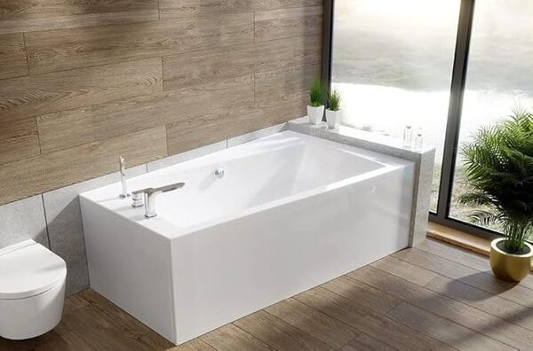 Baignoire d'angle originale en acrylique blanc Infinity 160 x 100 cm, kit complet avec tablier en acrylique blanc, pieds et bonde automatique exclusive chromée, fabriqué en UE, 4 en 1